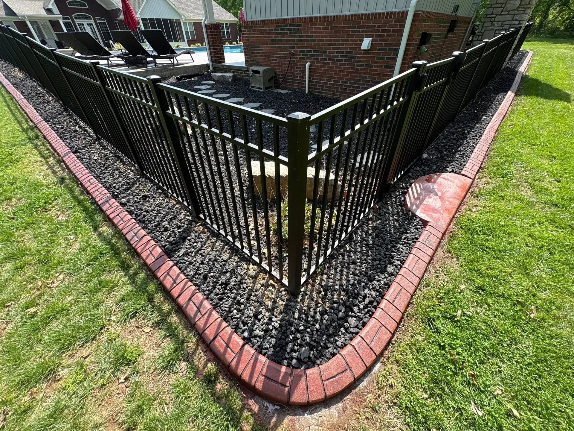 Decorative concrete curbing detail with stained finish