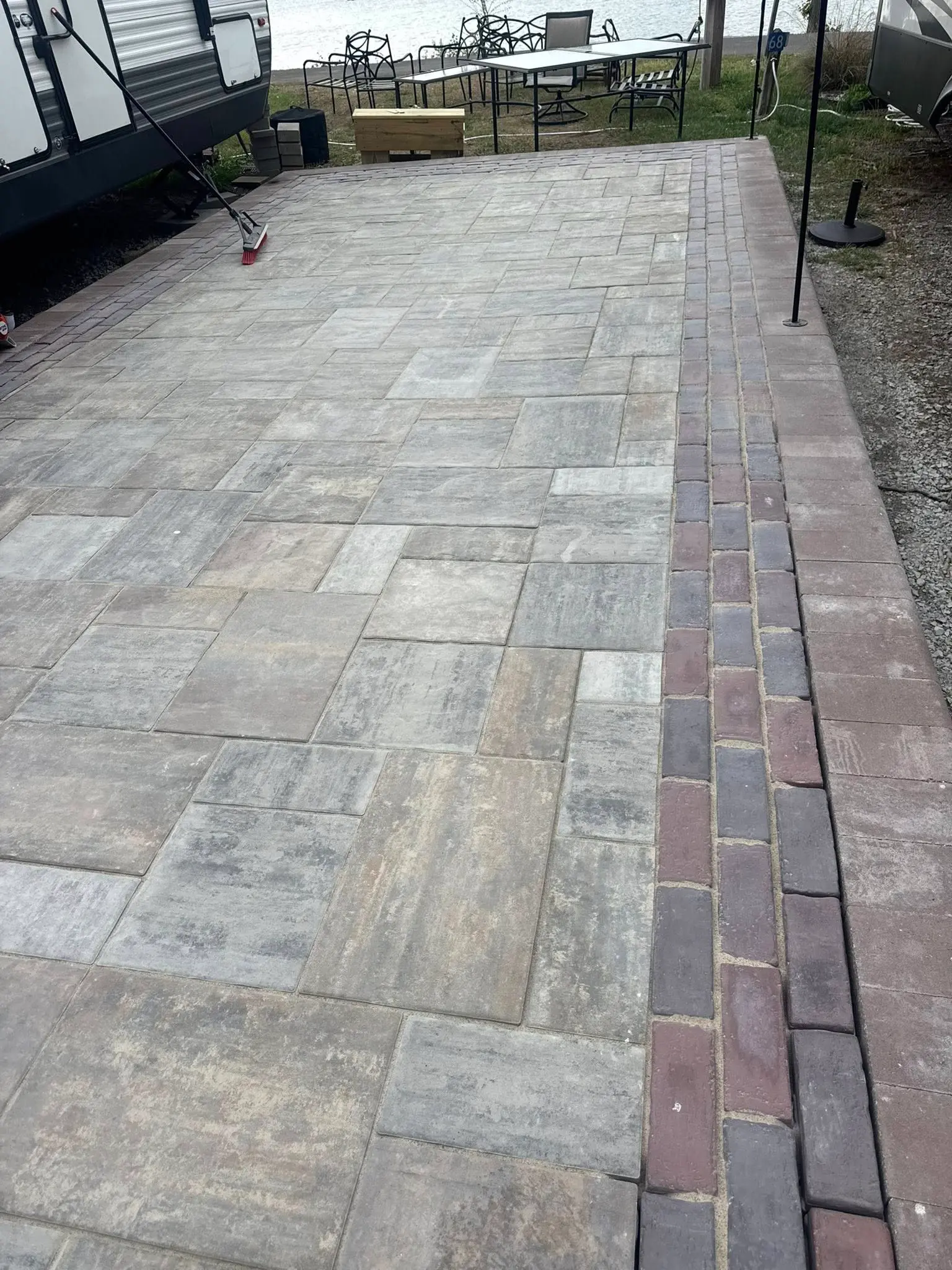 Stone paver patio with seating wall