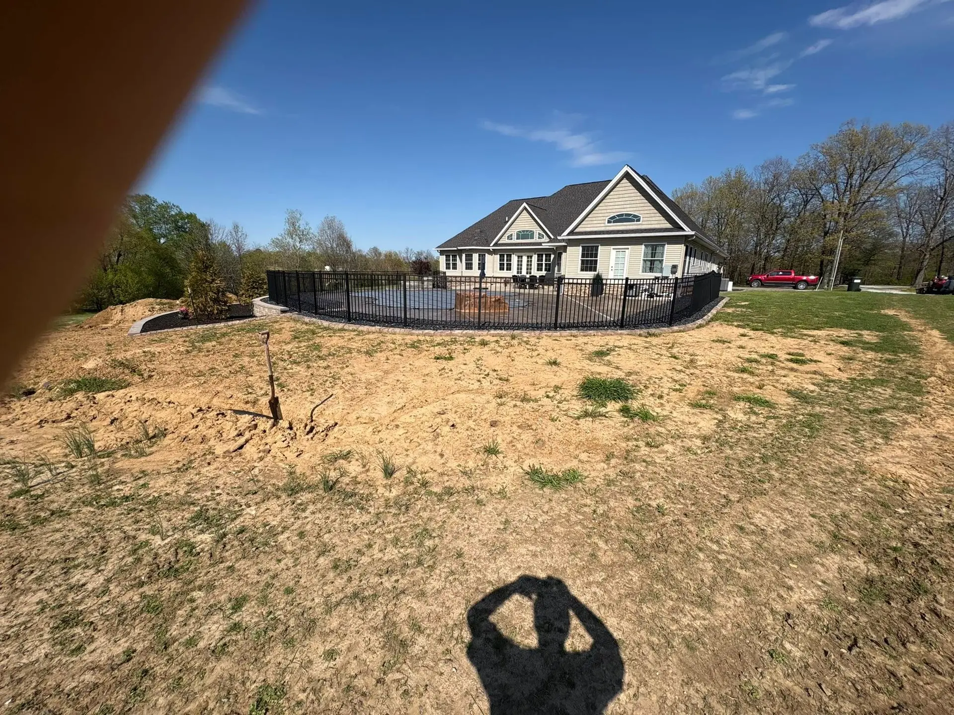 Graded and prepped lot with curbing and dirt work performed by The Muscle